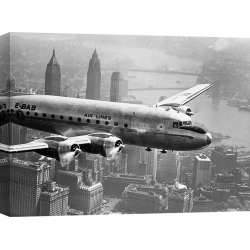 Quadro, stampa su tela. Aeroplano in volo sulla città, 1946